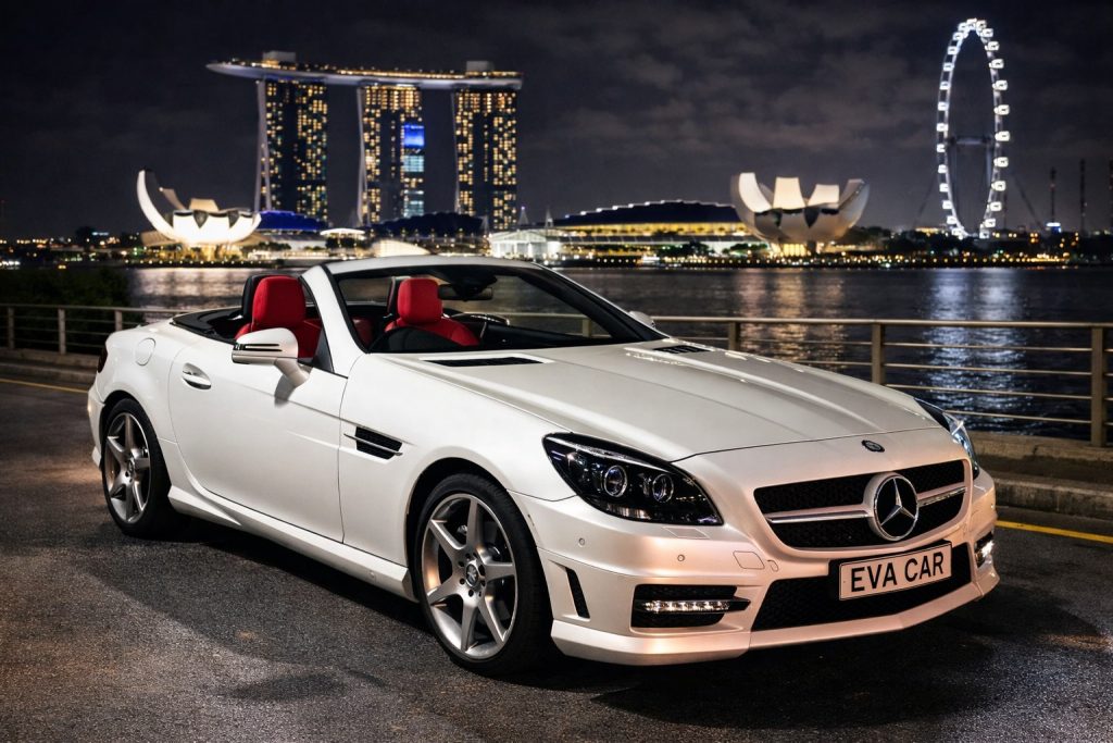 White Mercedes SLK convertible at Marina Bay at night on a birthday drive route