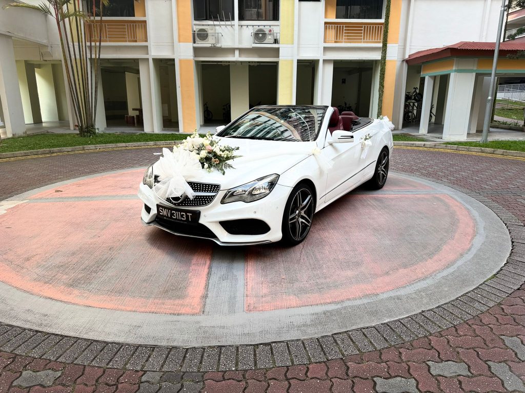 Open-top cabriolet prepared for a premium Singapore wedding and ROM arrival.
