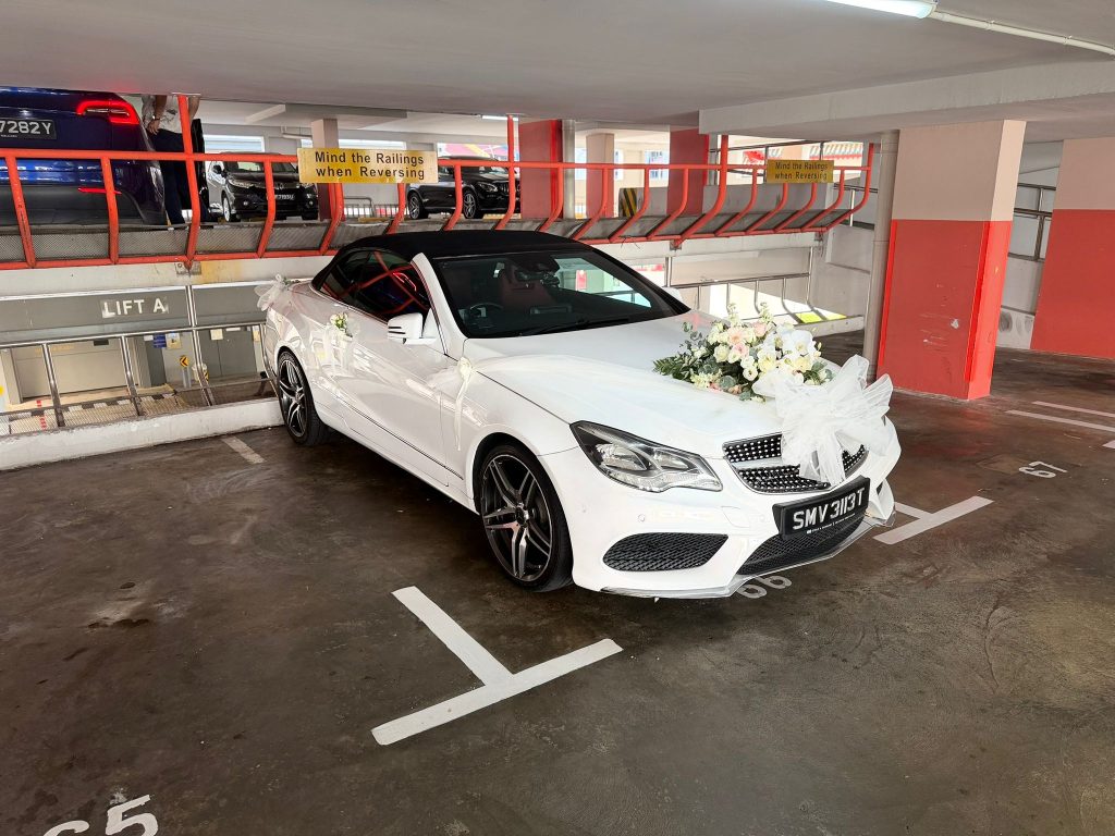 Mercedes convertible staged before a Singapore wedding arrival with clean presentation.