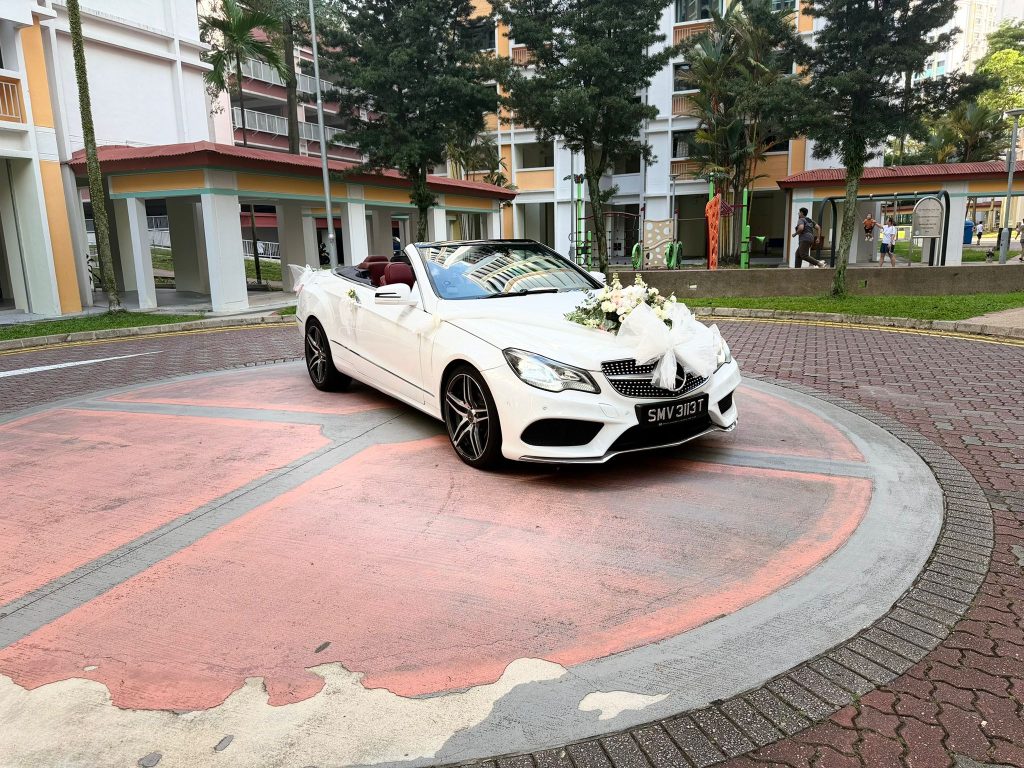 White convertible bridal car suitable for ROM portraits and Singapore wedding photos.