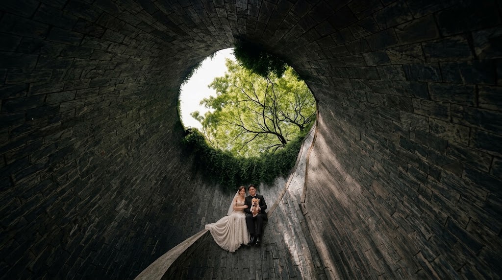 Newly-wed couple photographed inside the spiral Fort Canning tunnel in Singapore.