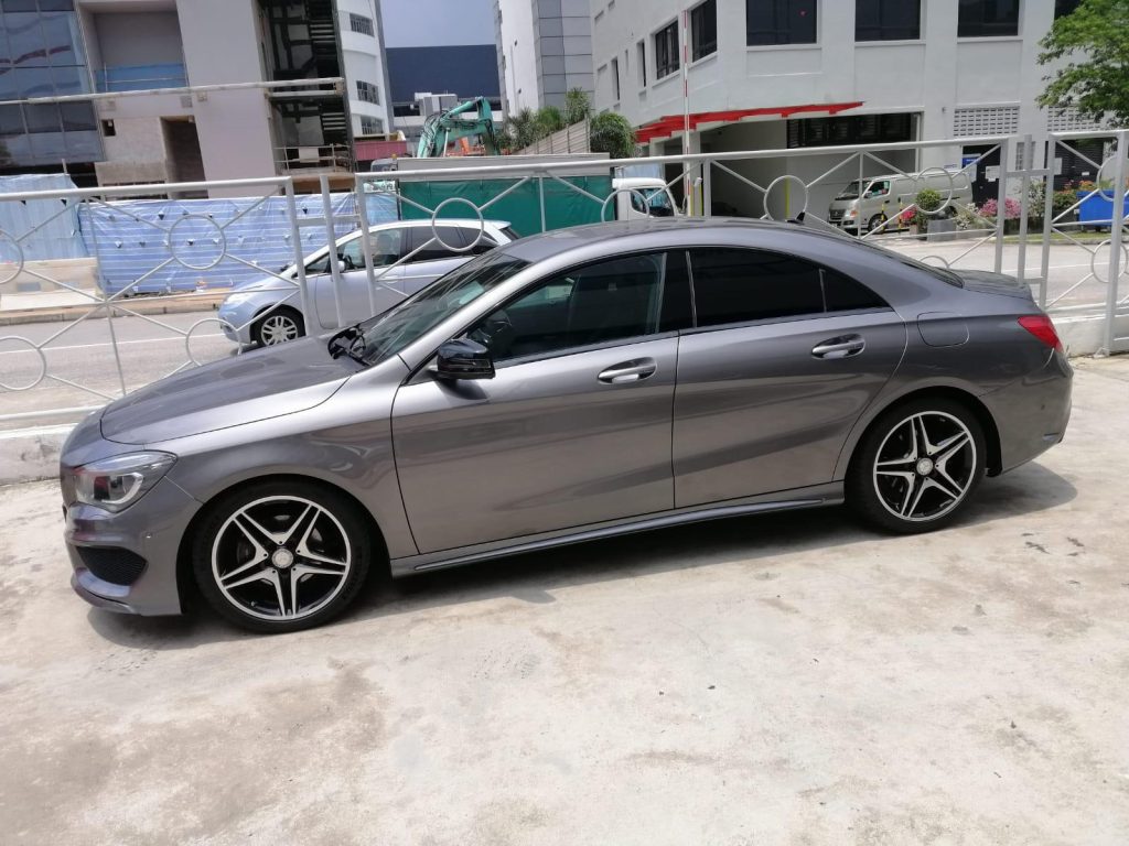 Open-top cars lined up at the Eva Car Rental pickup point for weekend convertible car rental Singapore bookings