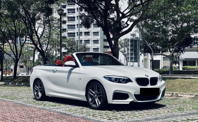 White BMW 218i Cabriolet, a four-seat alternative to a proposal sports car rental Singapore booking